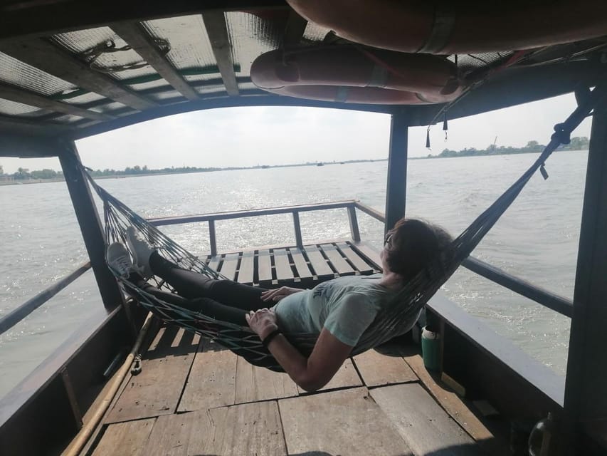 1-Day Less Touristy Mekong River (Cai Be-Vinh Long) trip - Cái Bè by traditional boat: canals, fruit orchards, and coconut groves