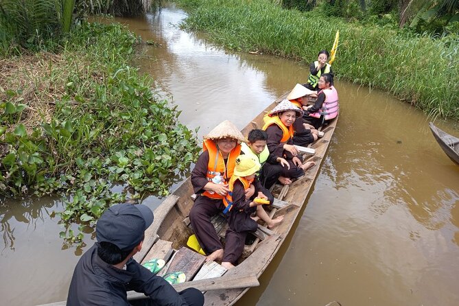 Cu chi Tunnel & Mekong Delta Full Day BBQ Lunch Lux Group 10 pax - Floating houses and a fishing village on the way back