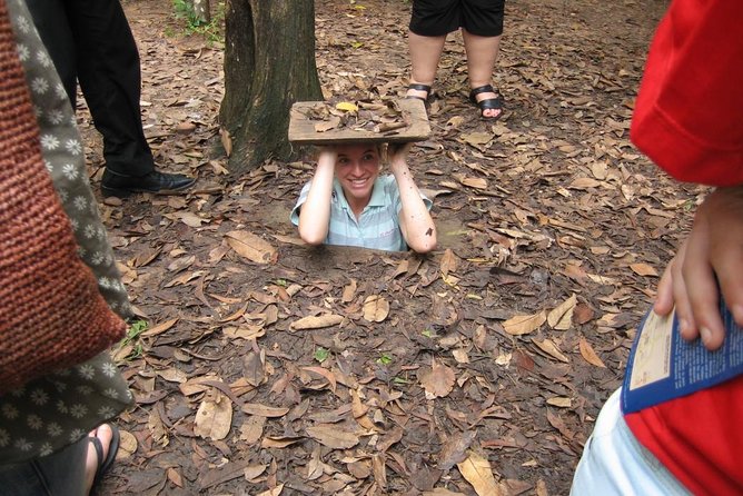 Cu Chi Tunnels and Cao Dai Temple private tour full day - Cu Chi Tunnels: kitchens, hospitals, and a crawl