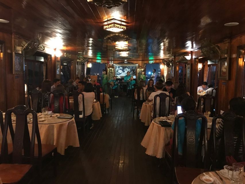 Deluxe Dining Cruise by DeluxeGroupTours - Dinner + Music + River Views from Nha Rong Harbor