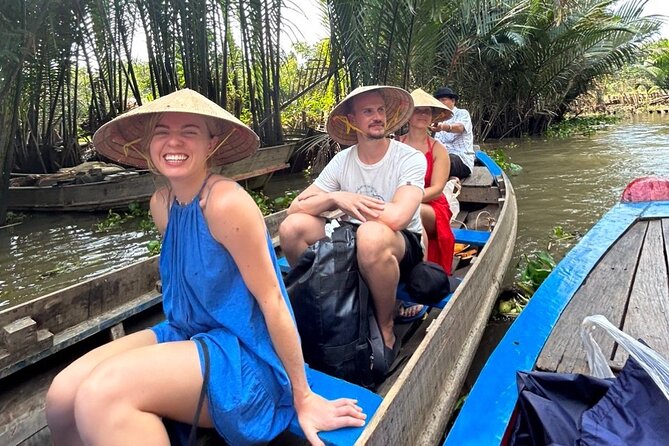 From HCM City: Mekong Delta Tour with Sampan Journey - The river in two speeds: motorboat cruising and slow sampan canals