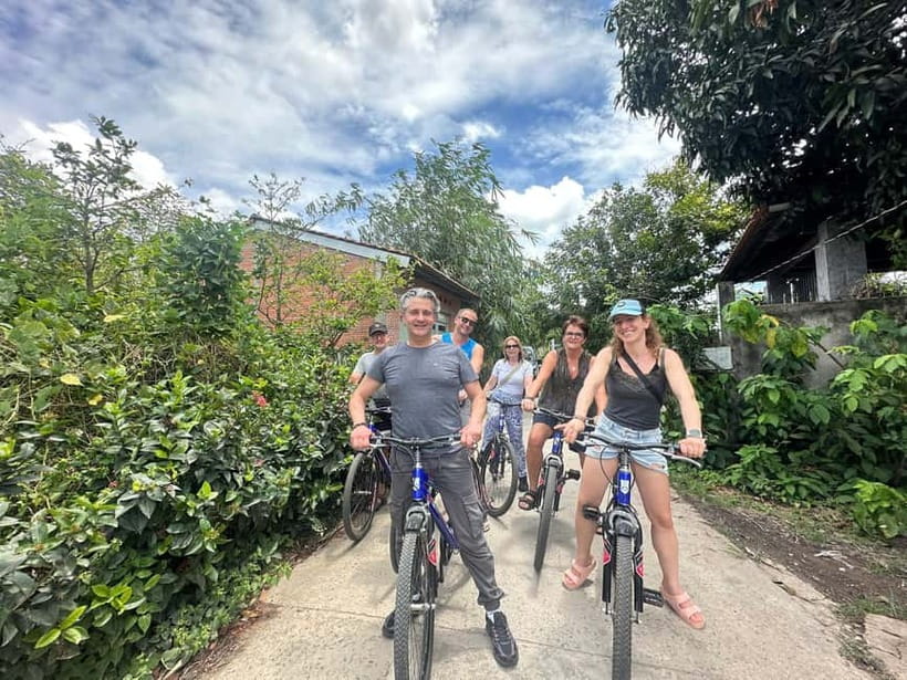From Ho Chi Minh: Cai Be Boat & Bike Mekong Delta Experience - Family Workshops: Rice Paper, Coconut Candy, and Popped Rice