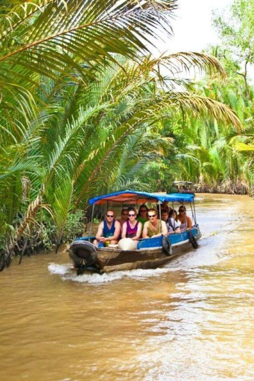 From Ho Chi Minh: Delta Full-Day Tour - The canal-and-coconut stretch: rowing boats and quiet scenery