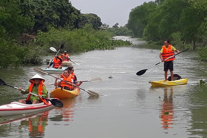 Full Day Experience Mekong River Life By Kayak & Boat. - Getting to the kayak: the transition from market bustle to quiet canals