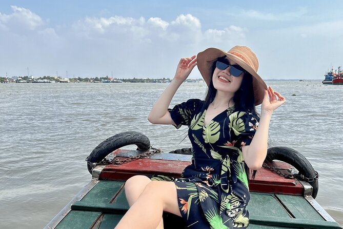 Full Day Guided Mekong Delta Day Tour in Vietnam (Multilingual) - Village stops, bicycling, and animal photo moments
