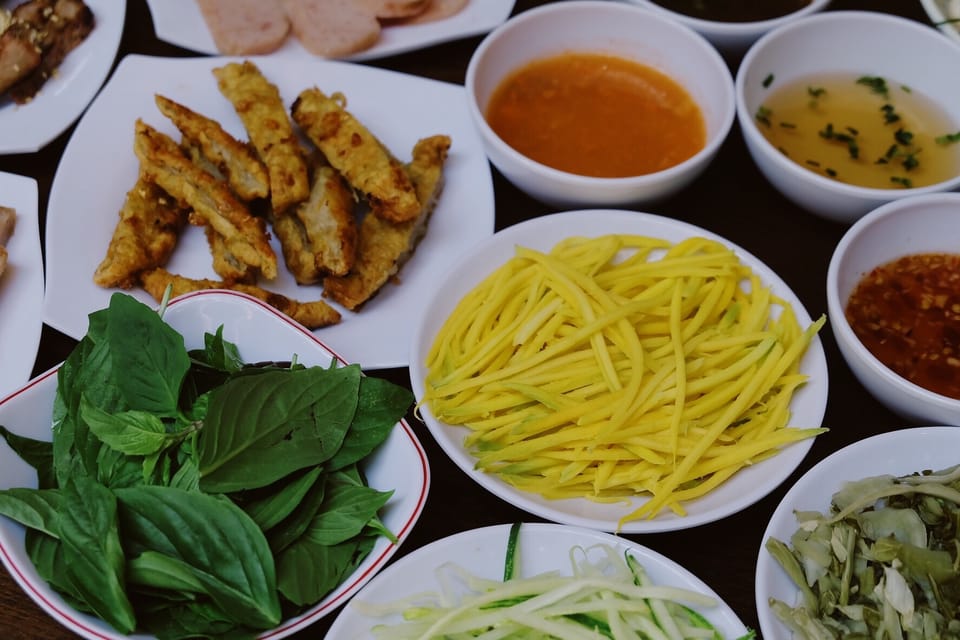 HCMC: A Taste of Vietnam Saigon Night Food Tour - Your guide on the bike: why names like Thuong2 and Hop matter
