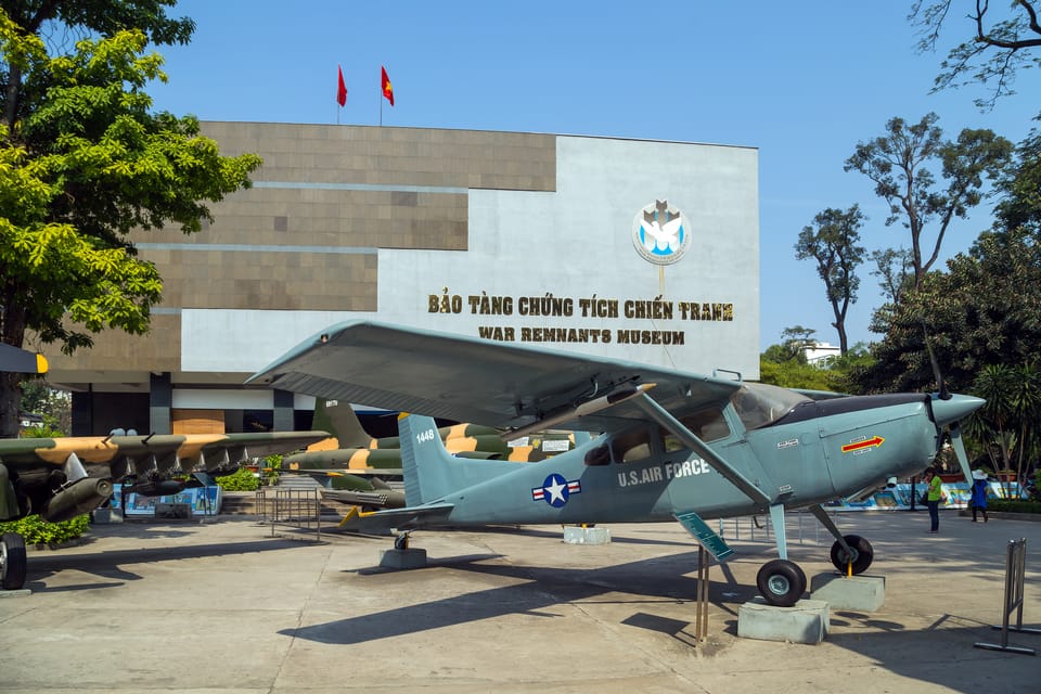 Ho Chi Minh City Cyclo Tour with English Speaking Guide - Nguyen Hue Street ride, Saigon River views, and Bitexco