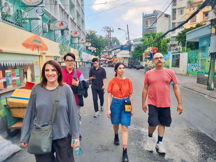 Ho Chi Minh City: Food Tastings & Sightseeings On Scooter - District 3 scooter time and street food: practical sightseeing between bites