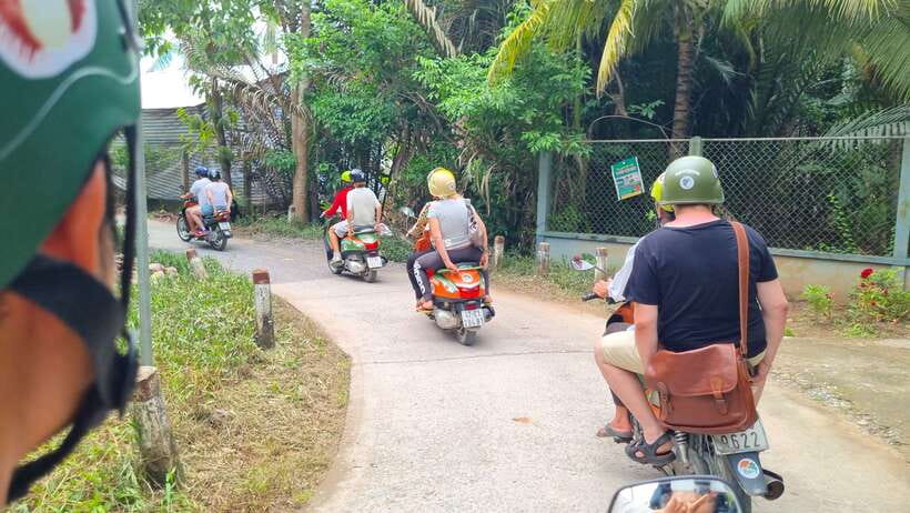 Ho Chi Minh City: Mekong Delta Day Trip with Lunch & Drinks - Ben Tre by motorbike, ferry, and canals: what the day feels like