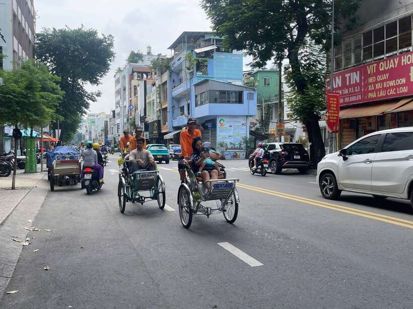 Ho Chi Minh City Sightseeing Panoramic Cycling Tour By Cyclo - Chinatown by Cyclo: Chinese Pagoda and Market Realities