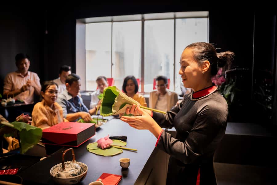 Ho Chi Minh City: Vietnamese Lotus Tea Culture Experience - Your lotus tea keepsake: insert tea leaves into a real flower