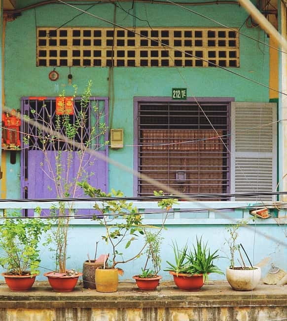 Ho Chi Minh City: Xom Cai Hidden Local Life Walking Tour - Ha Cao at a family-run stop: a snack, plus the food story behind it