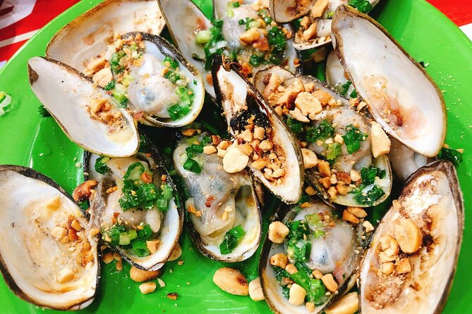 Ho Chi Minh Nightlife & Street Food Tour By Motorbike - Riding the Vespa-style scooter: exhilaration with safety in mind