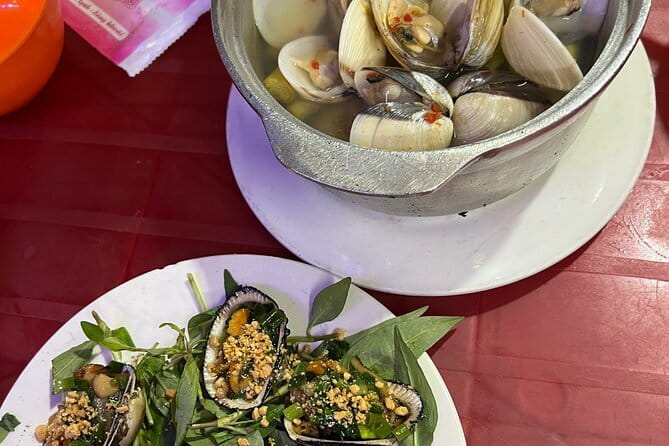 Ho Chi Minh Street Food & City Sights with Local Female Guide - Food Stops Plus a City Route: How the District Loop Feels
