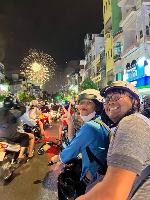 KISSTOUR| Saigon By Night & Street Food Tour on Motorbike - Saigon After Dark from a Scooter Seat