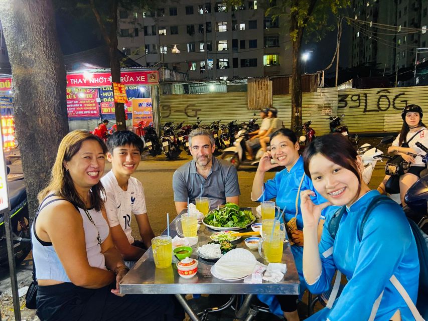 KISSTOUR| Saigon By Night & Street Food Tour on Motorbike - How Pickup, Helmets, and Ao Dai Guides Make the Ride Go Smooth