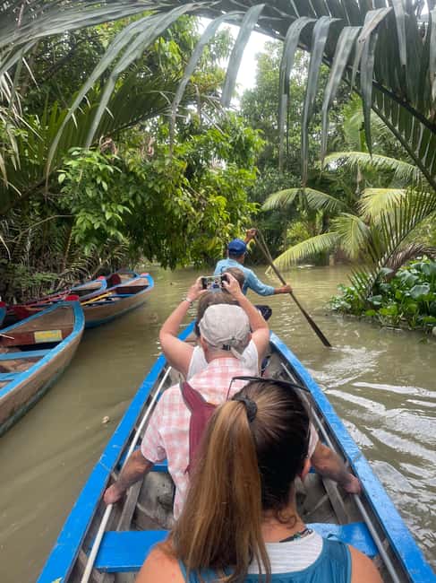 Mekong Day Trip Group 12pax Explore Bicycle & Cooking Class - Tien River calm: sampans, honey tea, and coconut candy