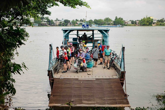 Mekong Delta 4 Days Cycling Trip-Off the Beaten Track - Day 2: Homestay breakfast, a boat section, and a coconut-focused Mekong stop