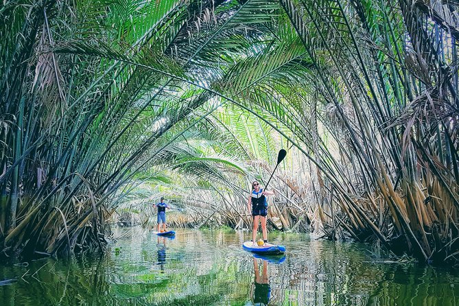 Paddling to explore the historic Vietnam War Rach Chiec jungle, - The simple rhythm of a 3-hour private SUP tour