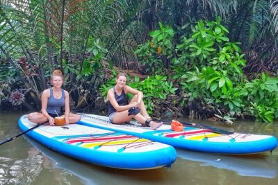 Paddling to explore the historic Vietnam War Rach Chiec jungle, - Entering the Rạch Chiếc jungle by SUP, not tour bus