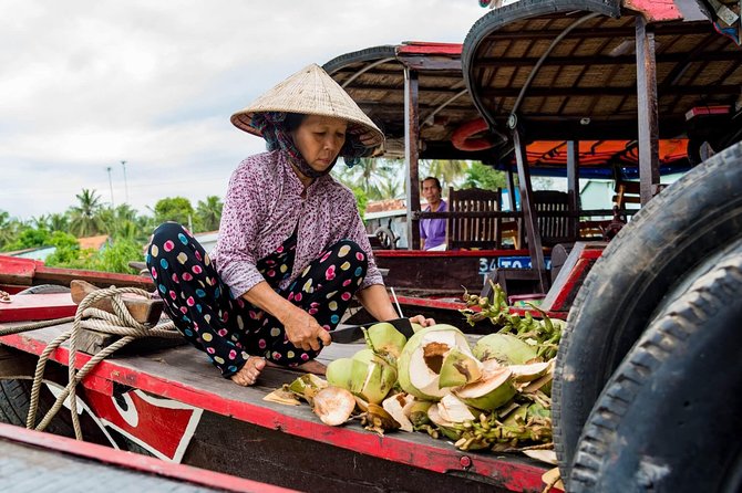 Private 2-Day Tour: Ho Chi Minh City to Cambodia by Mekong River - Mekong Delta motorboat canals, brick kiln views, and coconut work