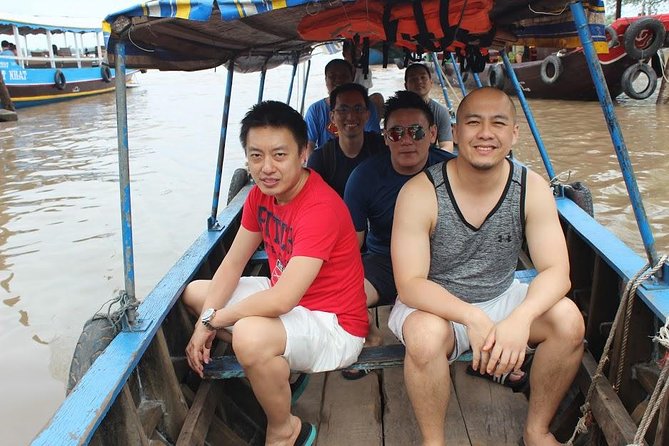 Private Cu chi Tunnels and Mekong Delta 1 Day - Countryside and a local wet market for fresh fruit