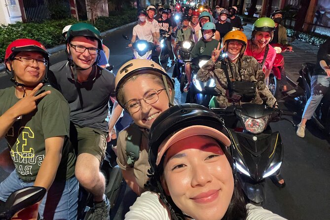 Private Discover Saigon Hidden Spots on Night Motorbike Adventure - District 10 food stop: baguette, beers, and real street energy