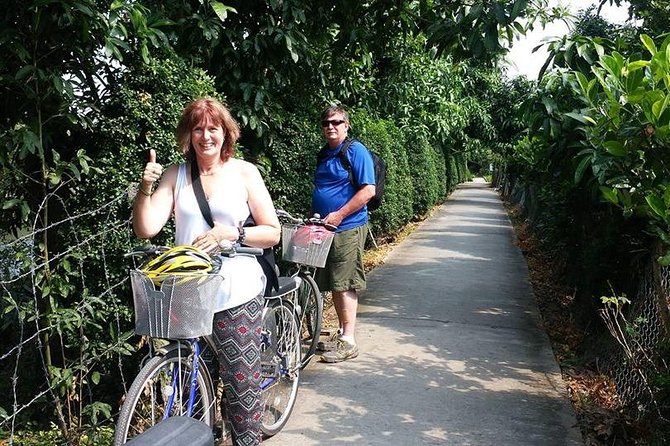 Private Mekong Delta Adventure: My Tho & Biking on BenTre Island - My Tho motorboat cruise: fish cages, stilt houses, and the working river