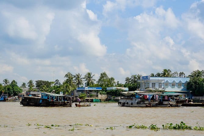 Private Mekong Delta tour to Cai Be – Tan Phong island full day - Cai Be floating market by boat, plus Tan Phong island life