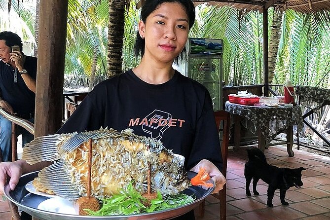 Private tour: Explore the authentic rural life in Ben Tre - Nam Bo Coconut Candy Mill: sweets plus fruit plus folk music