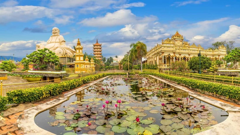 Private Vinh Trang Pagoda & Mekong Delta from Ho Chi Minh - Vinh Trang Pagoda: a temple where three cultures share the same road