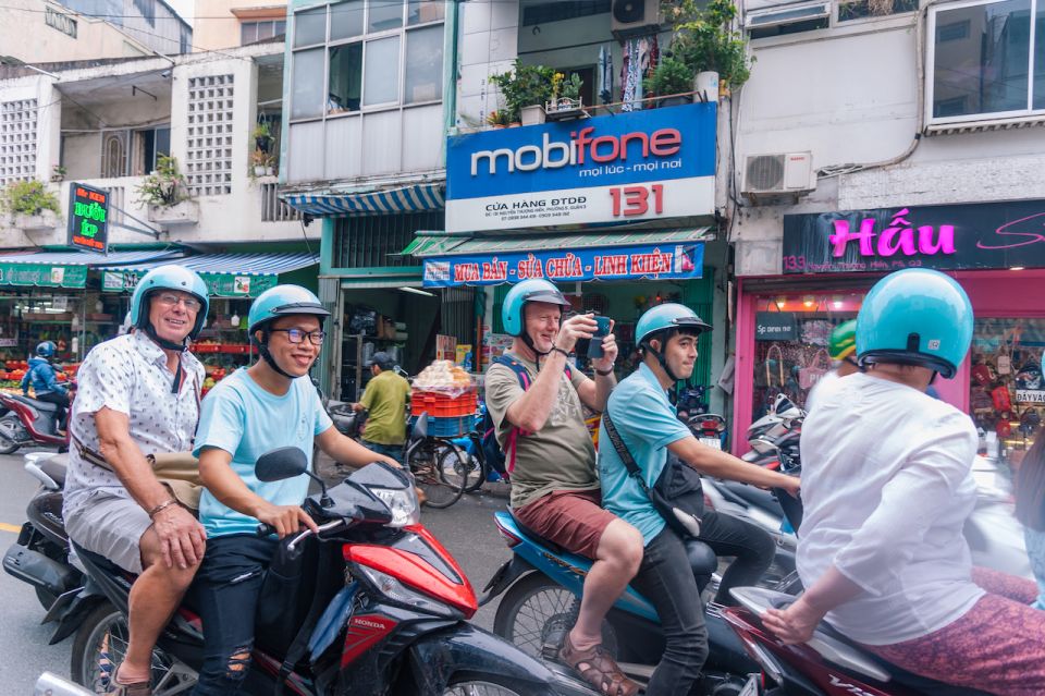 Saigon: City Highlights and Saigon Unseen Scooter Combo Tour - Saigon from the scooter: how the whole thing feels