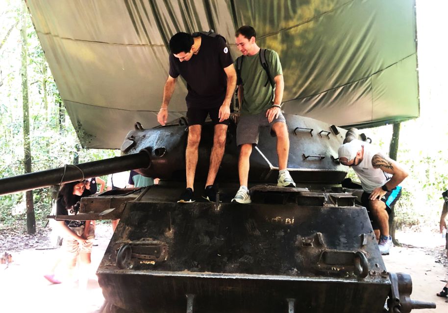Saigon History & Cu Chi Tunnels with War Museum 1-Day Tour - Entering the secret 100-meter Cu Chi tunnels