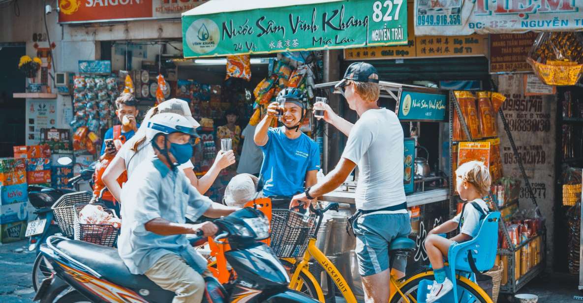 Saigon Off-the-Beaten Path-Cycling Tour in Ho Chi Minh City - District 10: Umbrella Market fruit tastings and flower-market etiquette