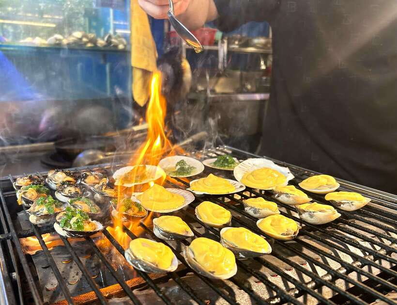 Secret walking Food Tour Ho Chi Minh City - Starting at Ben Nghe Street Food Market with an orange-umbrella guide