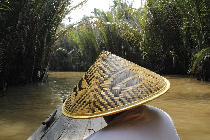 Shared Cu Chi Tunnels & Mekong Delta Tour Full Day - Food and drink: fruit, honey tea, and lunch that breaks up the day